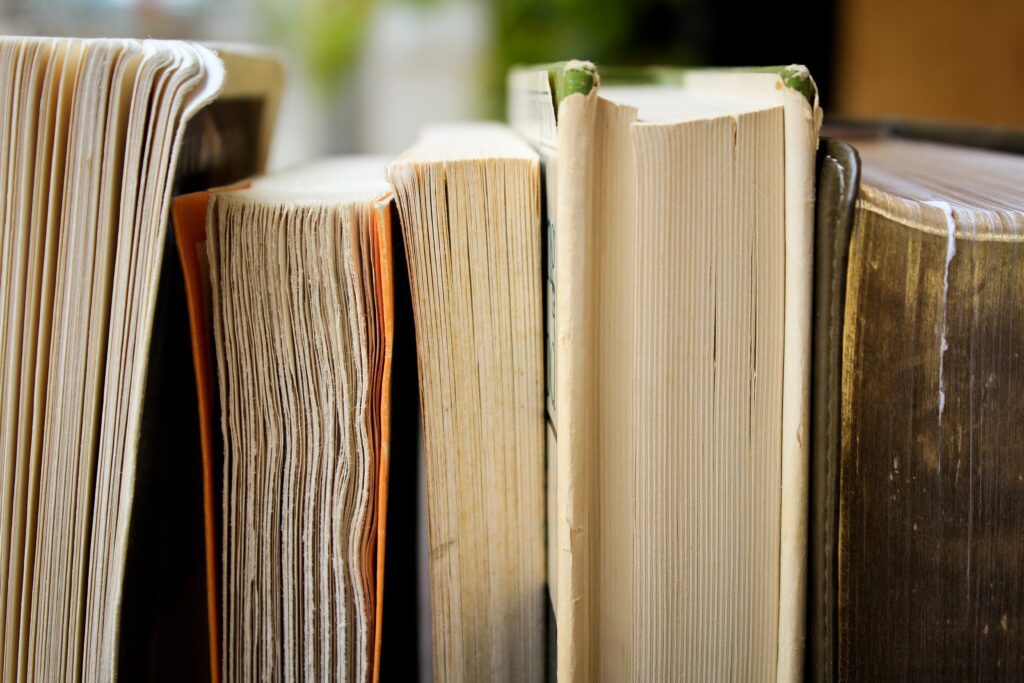 A close up of some books on the shelf
